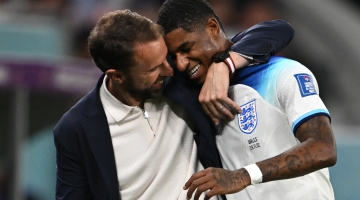 England coach Gareth Southgate congratulates Marcus Rashford as he is substituted after scoring two goals against Wales: AFP/Paul Ellis