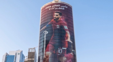 The poster of Qatar national team captain Hassan Al Haydos adorns the QOC building in Doha.