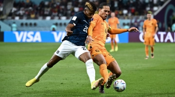 Ecuador’s Kevin Rodriguez, left, and Netherlands’ Virgil van Dijk fight for the ball: AFP/Jewel Samad