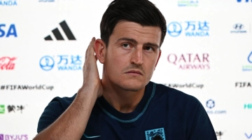 England's defender Harry Maguire addresses a press conference at the Qatar National Convention Center (QNCC) in Doha on November 24, 2022. (Photo by Paul ELLIS / AFP)