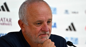 Australia's coach Graham Arnold attends a press conference at the Qatar National Convention Center (QNCC) in Doha on November 29, 2022. (Photo by Chandan Khanna / AFP)