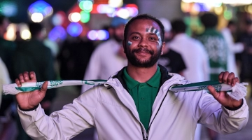 A Saudi football fan with face paint poses during celebrations in capital Riyadh on November 22: AFP