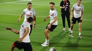 Poland's Grzegorz Krychowiak and Matty Cash in action during their FIFA World Cup Qatar 2022 training at Al Kharaitiyat SC Training Facilities in Umm Salal, Qatar, on November 18, 2022. REUTERS/Ibraheem Al Omari
