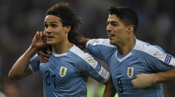 Edinson Cavani, left, and Luiz Suarez: AFP