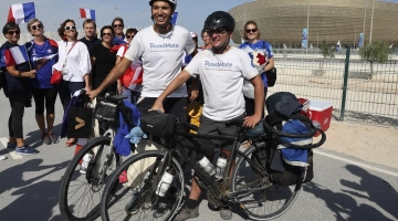 Gabriel Martin, right, and Mehdi Balamissa pose for pictures upon their arrival in Doha: AFP/Jack Guez