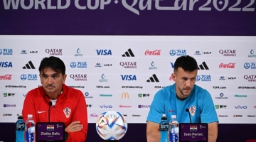 Croatia's coach Zlatko Dalic (left) and midfielder Ivan Perisic attend a press conference at the Qatar National Convention Center (QNCC) in Doha on November 26, 2022. (Photo by OZAN KOSE / AFP)