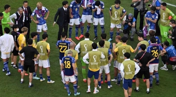 Japan players look dejected after they lost the Qatar 2022 World Cup Group E match against Costa Rica at the Ahmad Bin Ali Stadium in Al-Rayyan on November 27, 2022. (Photo by François-Xavier MARIT / AFP)