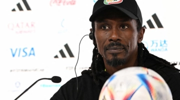 Senegal's coach Aliou Cisse attends a press conference at the Qatar National Convention Center (QNCC) in Doha on November 24, 2022, on the eve of the Qatar 2022 World Cup football match between Qatar and Senegal. (Photo by OZAN KOSE / AFP)