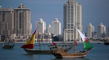 Traditional Qatari Dhow boats bearing Spain's and Wales' sails are pictured in Doha on November 29, 2022, during the Qatar 2022 World Cup football tournament. (Photo by NATALIA KOLESNIKOVA / AFP)