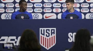USA's forward Christian Pulisic (right) and USA's forward Timothy Weah give a press conference at Al Gharafa SC Stadium in Doha on December 1, 2022. (Photo by JUAN MABROMATA / AFP)