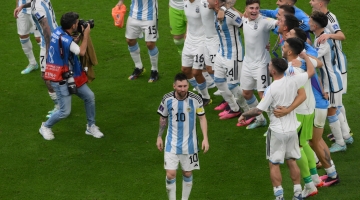 Argentinian players celebrate their semifinal victory over Croatia: AFP/Paul Ellis