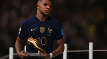 France’s Kylian Mbappe holds the FIFA Golden Boot award: AFP/Adrian Dennis