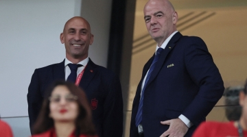 FIFA President Gianni Infantino stands alongside RFEF president Luis Rubiales (left) during the match between Morocco and Spain at the Education City Stadium in Al-Rayyan on December 6, 2022. (Photo by KARIM JAAFAR / AFP)
