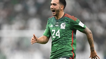 Mexico's Luis Chavez celebrates scoring his team's second goal during the Qatar 2022 World Cup Group C match against Saudi Arabia at the Lusail Stadium in Lusail on November 30, 2022. (Photo by Alfredo ESTRELLA / AFP)