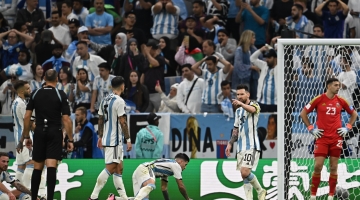Argentina captain Lionel Messi, second right, and team-mates react after the Netherlands’ Wout Weghorst scored their second goal during their quarterfinal: AFP/Manan Vatsyayana