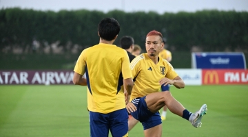 Japan's defender Yuto Nagatomo takes part in a training session at the Al Sadd SC training grounds in Doha on December 4, 2022. (Photo by Ina Fassbender / AFP)