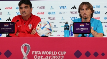 Croatia's coach Zlatko Dalic (left) and midfielder Luka Modric hold a press conference at the Qatar National Convention Center (QNCC) in Doha on December 8, 2022. (Photo by JACK GUEZ / AFP)