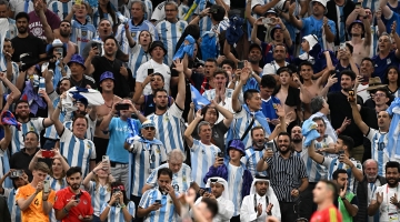 Argentina fans celebrate their victory quarterfinal victory over the Netherlands at Lusail Stadium: AFP/Manan Vatsyayana