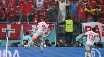 Switzerland's midfielder Remo Freuler celebrates scoring his team's third goal during the Qatar 2022 World Cup Group G match against Serbia at Stadium 974 in Doha on December 2, 2022. (Photo by Ina Fassbender / AFP)