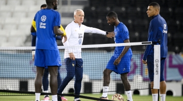 France coach Didier Deschamps puts his players through their paces at the Al Sadd SC training centre ahead of the final against Argentina: AFP/Franck Fife