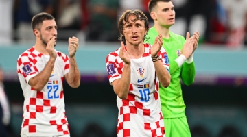 Luka Modric, centre, with team-mates: AFP