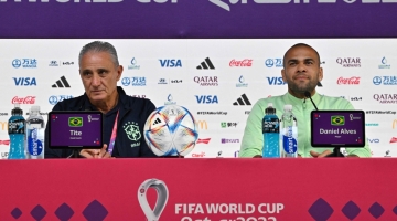 Brazil's coach Tite (left) and Dani Alves give a press conference at the Qatar National Convention Center (QNCC) in Doha on December 1, 2022. (Photo by NELSON ALMEIDA / AFP)