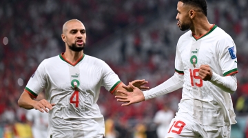Morocco’s Youssef En-Nesyri, right, celebrates with team-mate Sofyan Amrabat after scoring against Canada: AFP/Natalia Kolesnikova