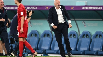 Australia's coachGraham Arnold celebrates after Australia won the Qatar 2022 World Cup Group D match against Denmark at the Al-Janoub Stadium in Al-Wakrah on November 30, 2022. (Photo by Paul ELLIS / AFP)