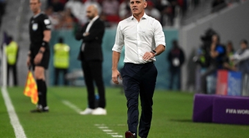 Canada's coach John Herdman watches his players from the touchline during the Qatar 2022 World Cup Group F match against Morocco at the Al-Thumama Stadium in Doha on December 1, 2022. (Photo by Patrick T. Fallon / AFP)