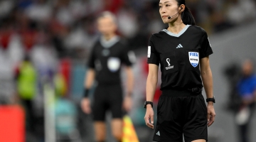 Japanese fourth official Yoshimi Yamashita looks on during the match between Wales and England on November 29: AFP/Nicolas Tucat