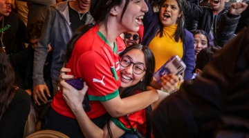 Morocco's supporters celebrate their country's opener during the Qatar 2022 World Cup match between Morocco and portugal, at a coffee shop in Rabat, on December 10, 2022. (Photo by FADEL SENNA / AFP)