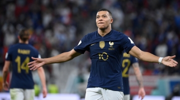 France’s Kylian Mbappe celebrates scoring against Poland: AFP/Franck Fife