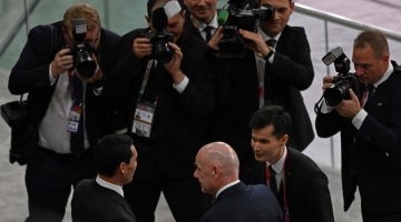 FIFA President Gianni Infantino (center, bottom) is pictured ahead of the Qatar 2022 World Cup round of 16 match between the Netherlands and USA at Khalifa International Stadium in Doha on December 3, 2022. (Photo by Raul ARBOLEDA / AFP)