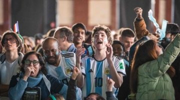 Fans react as Argentina scores a goal against France in the Qatar 2022 World Cup Final football match during a watch party at SOWA in Boston, Massachusetts, on December 18, 2022. (Photo by Joseph Prezioso / AFP)