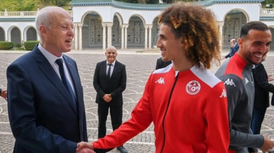Tunisia face ban. Credit: Agency