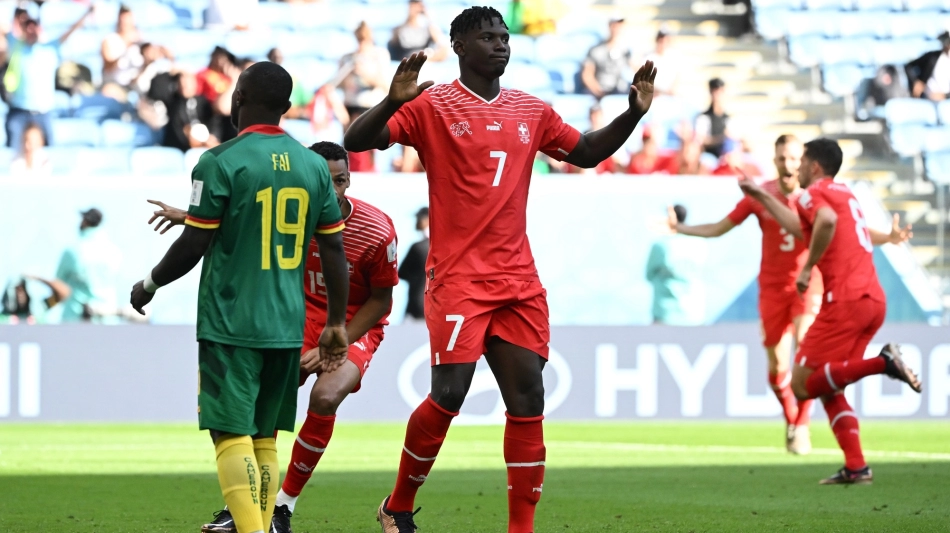 Switzerland’s Breel Embolo celebrates after scoring the winner against Cameroon: AFP/Fabrice Coffrini