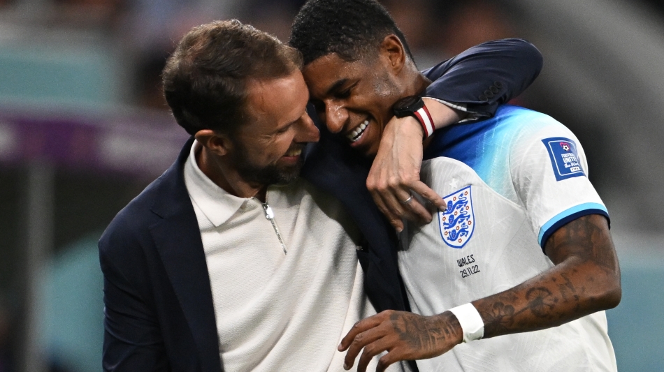 England coach Gareth Southgate congratulates Marcus Rashford as he is substituted after scoring two goals against Wales: AFP/Paul Ellis