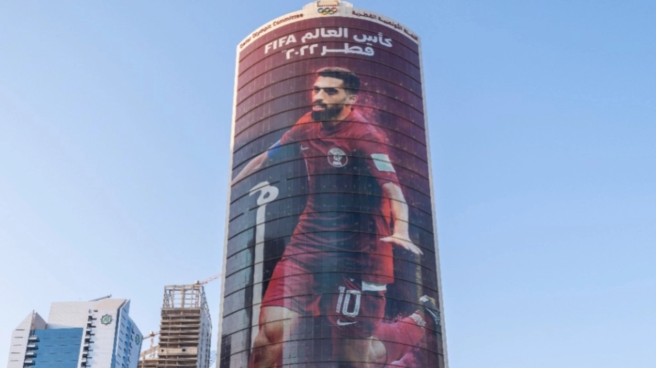 The poster of Qatar national team captain Hassan Al Haydos adorns the QOC building in Doha.