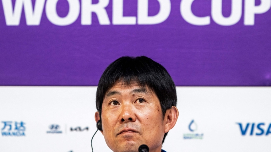 Japan's coach Hajime Moriyasu attends a press conference at the Qatar National Convention Center (QNCC) in Doha on November 30, 2022. (Photo by Philip FONG / AFP)