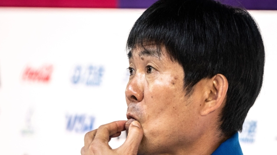 Japan's coach Hajime Moriyasu attends a press conference at the Qatar National Convention Center (QNCC) in Doha on November 26, 2022. (Photo by Philip FONG / AFP)