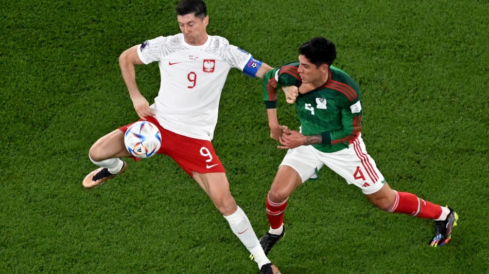 Poland’s Robert Lewandowski, left, and Mexico’s Edson Alvarez vie for the ball in their World Cup match on November 22: AFP/Francois-Xavier Marit