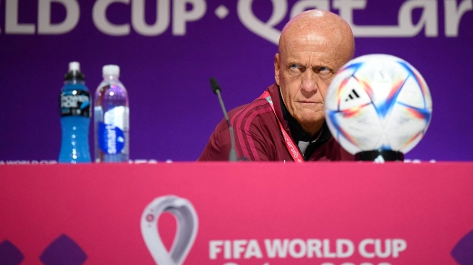 FIFA referees committee chairman Pierluigi Collina addresses a press conference at the Qatar National Convention Center (QNCC) in Doha on November 18, 2022, ahead of the Qatar 2022 World Cup football tournament. (Photo by Anne-Christine POUJOULAT / AFP)