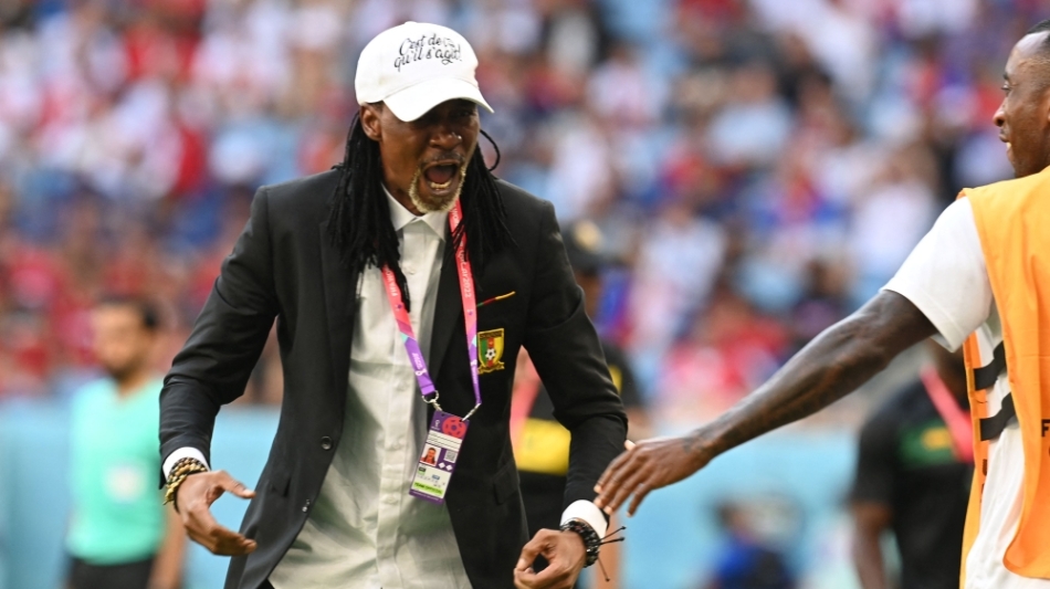 Cameroon's coach Rigobert Songreacts after his team scored the first goal during the Qatar 2022 World Cup Group G match against Serbia at the Al-Janoub Stadium in Al-Wakrah on November 28, 2022. (Photo by Issouf SANOGO / AFP)