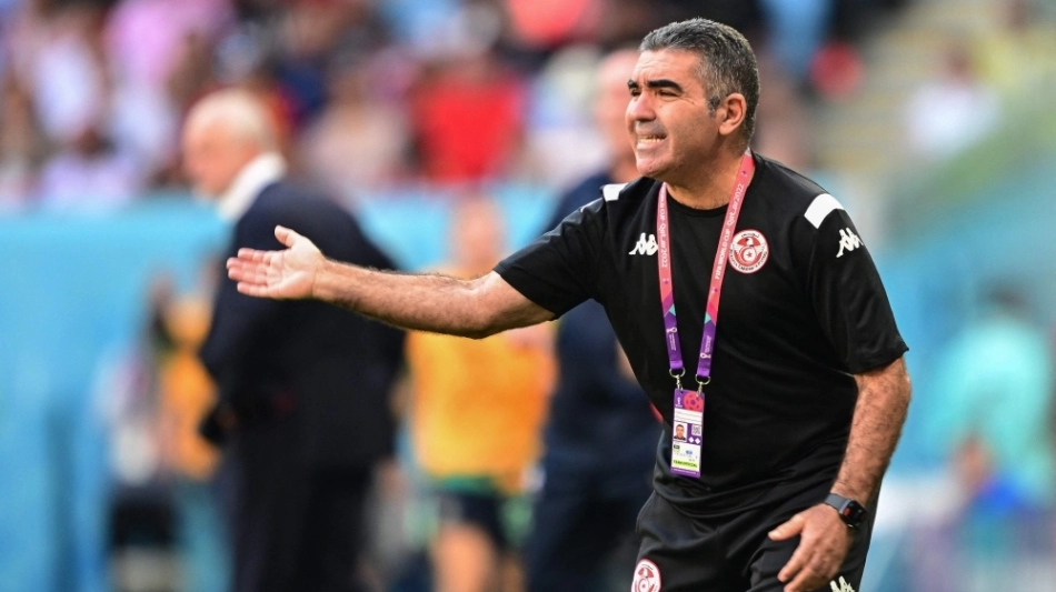 Coach Jalel Kadri gestures on the touchline during the Qatar 2022 World Cup Group D match against Australia at the Al-Janoub Stadium in Al-Wakrah on November 26, 2022. (Photo by Miguel MEDINA / AFP)