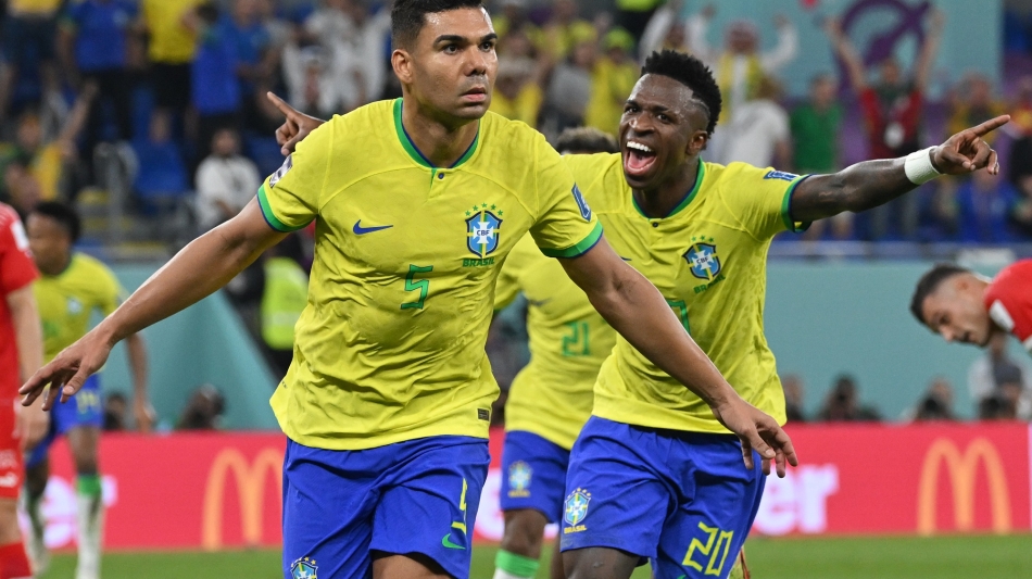 Brazil’s Casemiro, left, Vinicius Junior celebrate after the former scored their winner against Switzerland: AFP/Nelson Almeida