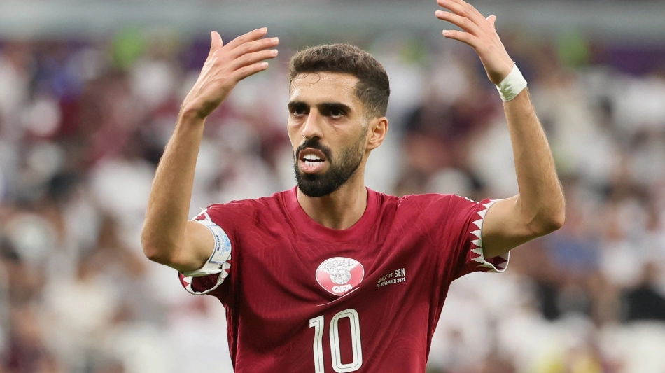 Qatar captain Hassan Al Haydous: AFP/Karim Jaafar