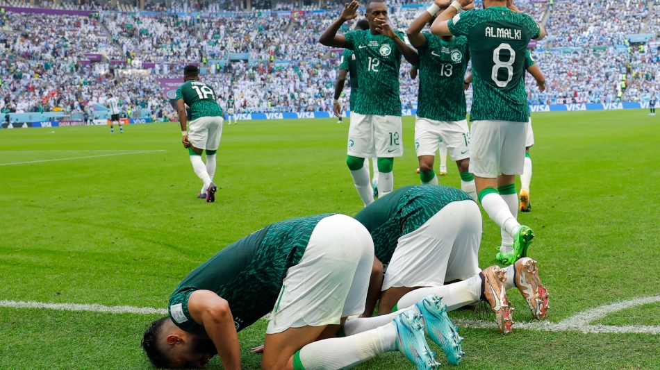Saudi Arabia players celebrate the win: AFP