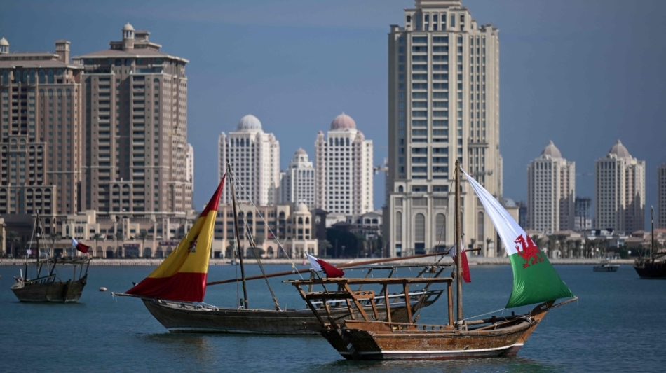 Traditional Qatari Dhow boats bearing Spain's and Wales' sails are pictured in Doha on November 29, 2022, during the Qatar 2022 World Cup football tournament. (Photo by NATALIA KOLESNIKOVA / AFP)