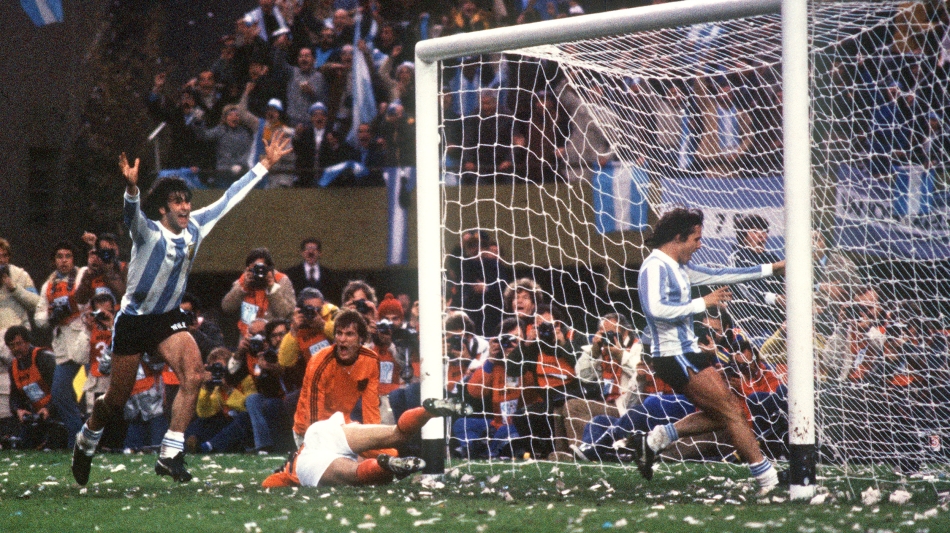 This file photo taken on June 25, 1978, shows Argentina’s Mario Kempes, left, celebrating after scoring against the Netherlands in the final in Buenos Aires: AFP