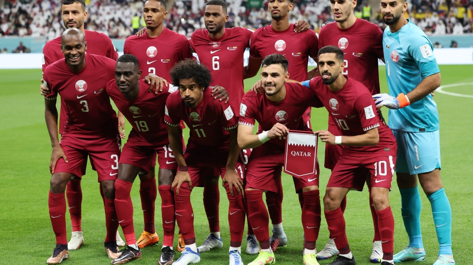 Qatar team: AFP/Karim Jaafar